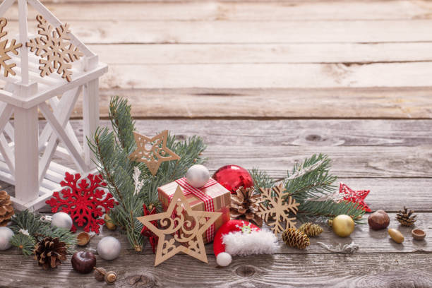 istock Christmas decoration with white lantern  on wooden background 877281706