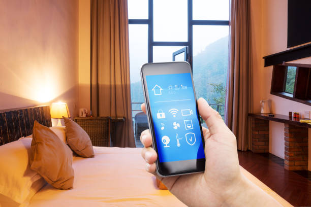 istock smart phone with smart home with modern bedroom 877281956