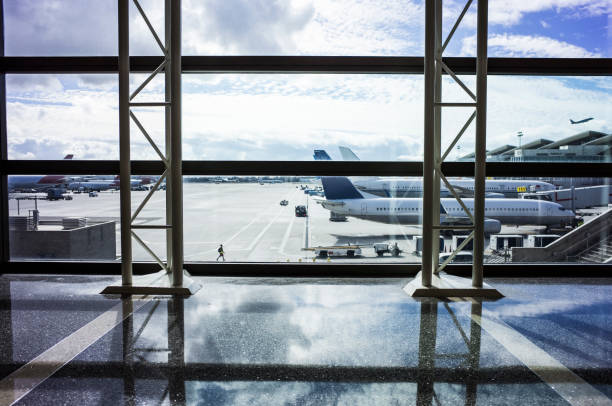 istock Blue sky and airplane seen from airport. 877284872