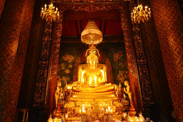 istock golden Buddha image enshrined in Thailand 877294370