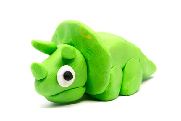 istock Play dough Triceratopson white background 877300434