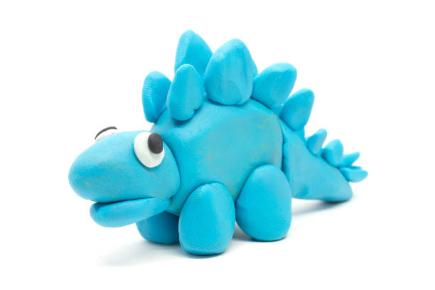 istock Play dough Stegosaurus on white background 877300442