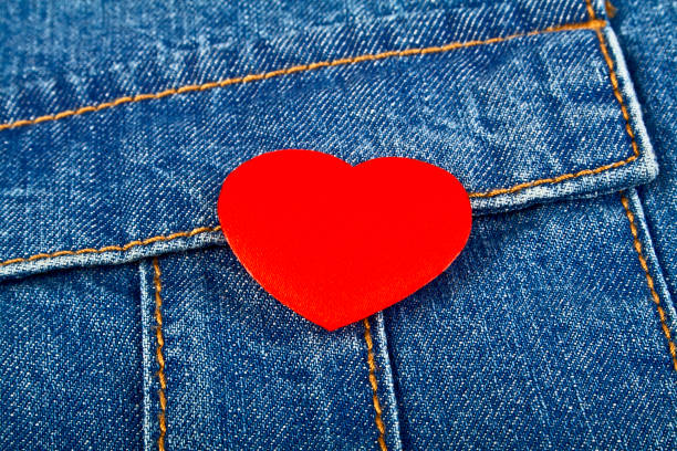istock Red heart in jeans pocket 877305042