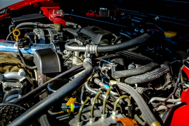 istock Powerful engine under the hood of a modern car 877312380