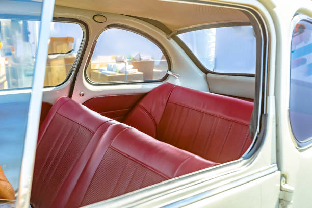 istock Old fashioned leather seats in compact car 877313312