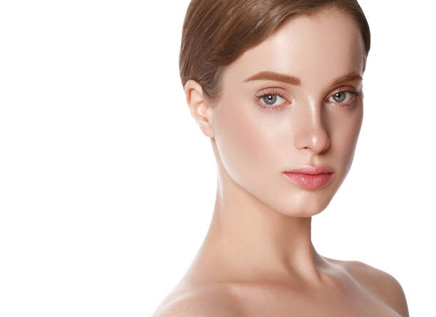 istock Beautiful woman face close up studio on white. 877313626
