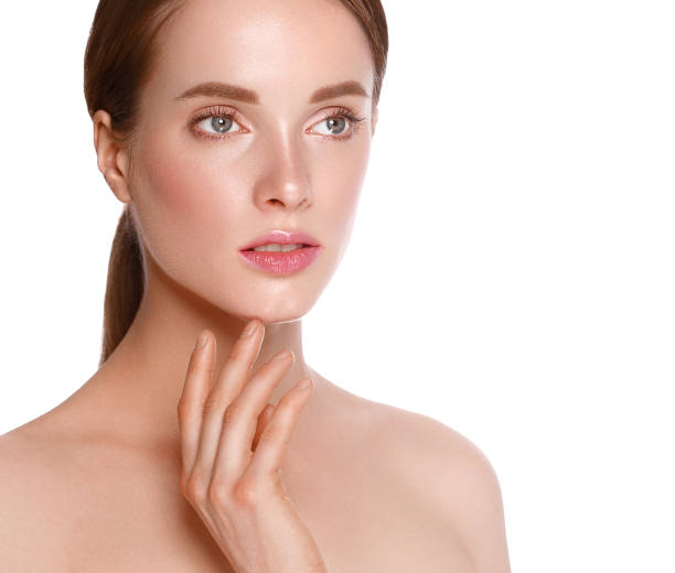 istock Beautiful woman face close up studio on white. 877313696