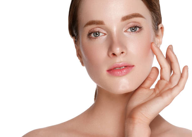 istock Beautiful woman face close up studio on white. 877313918