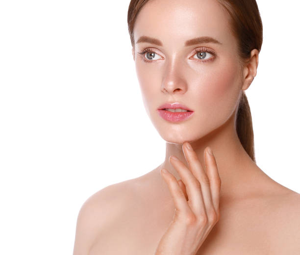 istock Beautiful woman face close up studio on white. 877316286