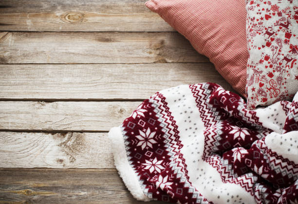 istock plaid and pillow  on wooden background 877316770