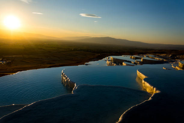 istock Beatiful sunset in Pamukkale valley 877320712