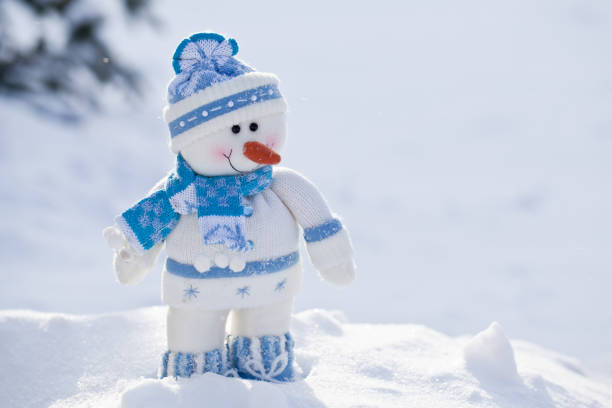 istock Little snowman with carrot nose. 877321506