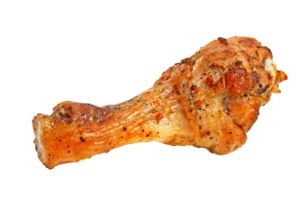 istock Grilled chicken leg on a white background 877325470