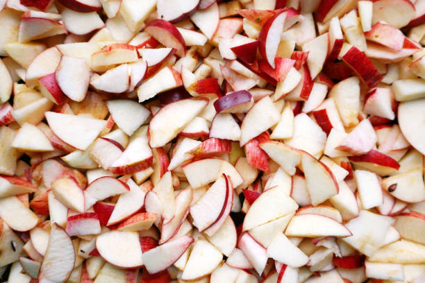 istock Texture of fresh apple pieces close up. 877325740