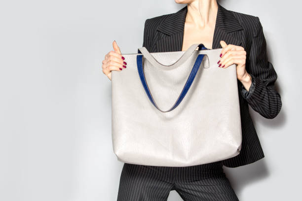 istock Stylish beautiful woman with bag 877333464