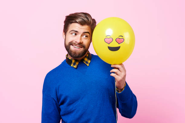istock In love eccentric with balloon dreaming 877333772