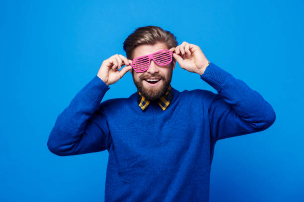 istock Cheerful man with sunglasses having a fun 877334130