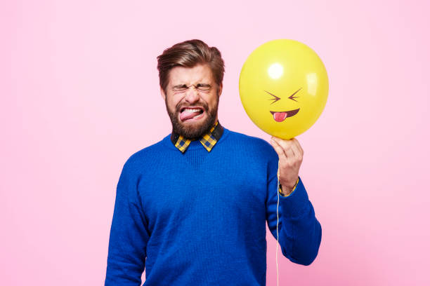 istock Handsome man showing feeling of disgust 877336630