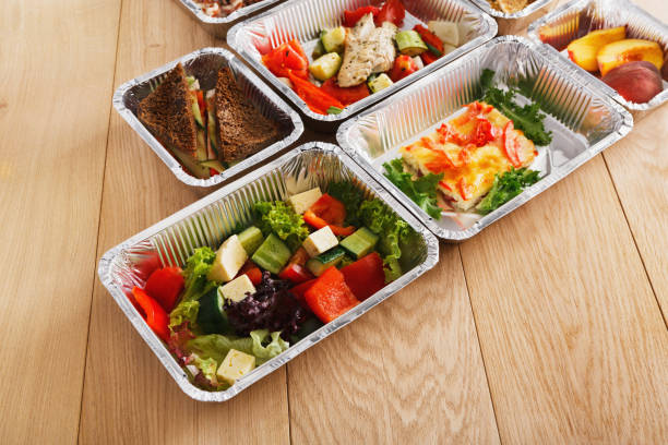 istock Healthy food in boxes, diet concept. 877336692