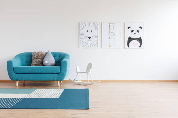 istock Sofa in bright kid's room 877338272