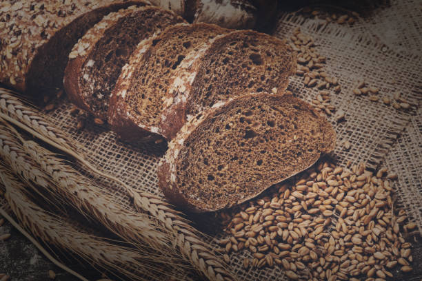 istock Bakery concept. Plenty of sliced rye bread background 877341144