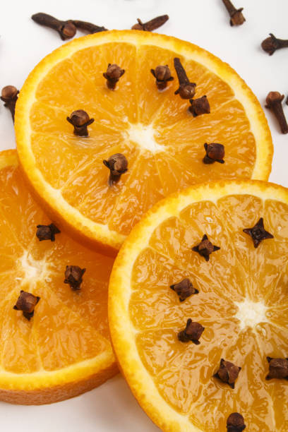 istock orange slices peppered with spice cloves 877341548