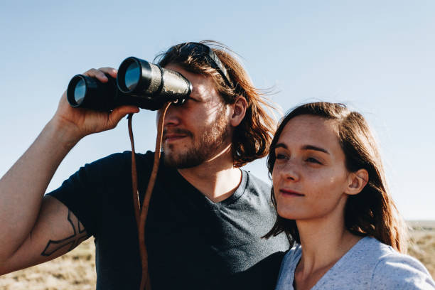 istock Couple hiking together in the wilderness 877348688