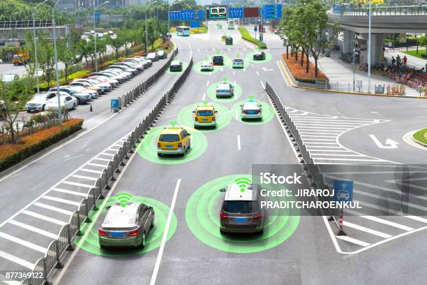 Smart Car And Autonomous Selfdriving Mode Vehicle On Metro City Road With Graphic Sensor Signal Stock Photo - Download Image Now