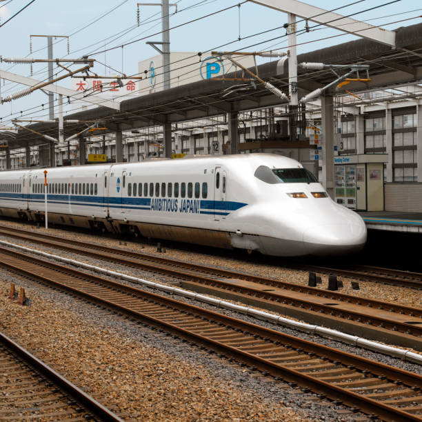 A Shinkansen Bullet Train in Tokyo, Japan. The Shinkansen or bullet trains, run on a network of high-speed railway lines in throughout Japan. The maximum operating speed is 320 km/h (200 mph).