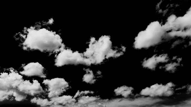 istock White cloud isolated on black background, Black and white cloudscape image 877356456