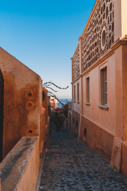 istock Santorini sunrise in Oia Greece 877359440