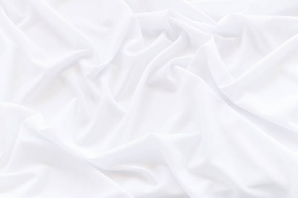 istock White cloth background and texture, Crumpled of white fabric abstract 877364970
