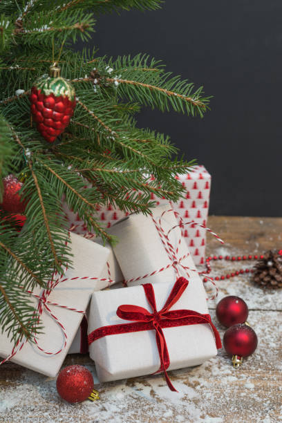 istock Christmas holiday background. Gifts under christmas tree. 877365800