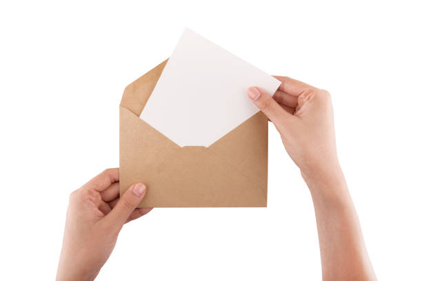 brown envelope isolate on white background - hand wrap imagens e fotografias de stock