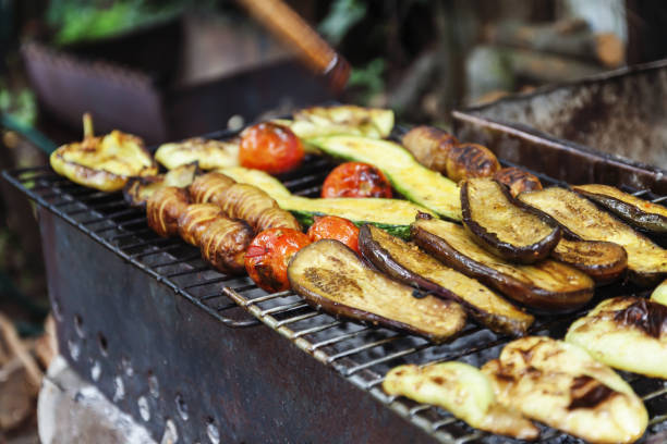 istock Assorted grilled vegetables.Chef cooking vegetables.top view close up 877372444