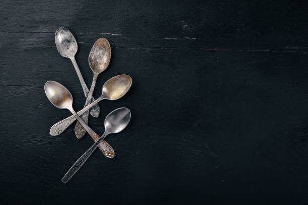 istock Old cutlery. On a wooden background. Top view. Free space for text. 877372524