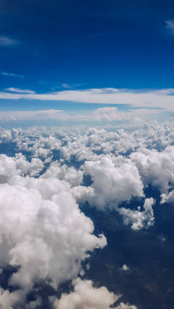 istock Beautiful group of cloud with blue sky in Vertical view 877373488