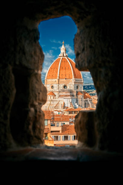 istock View Of Cityscape Against Sky Seen Through Window 877374002