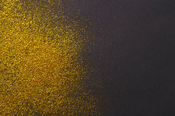 istock Golden glitter sand texture, abstract background. 877374322