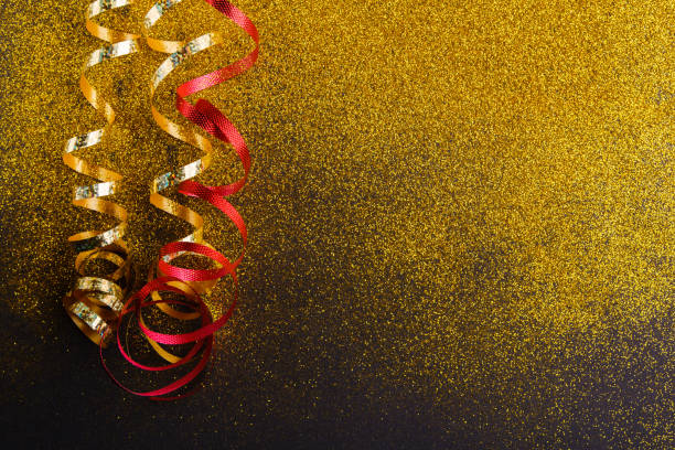 istock Red and golden serpentine on white background 877380890