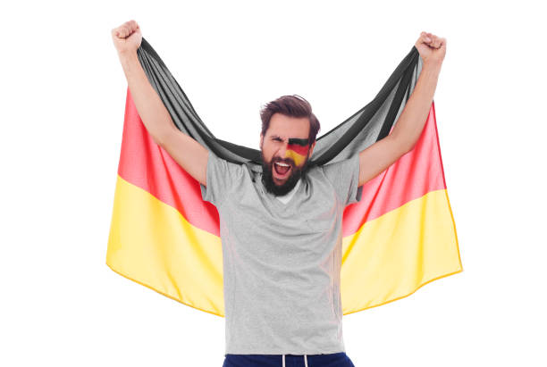istock Screaming man waving a national flag and cheering 877381538