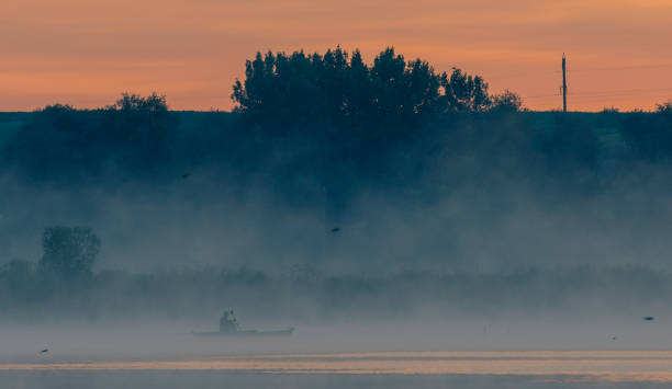 istock Foggy river morning 877381760