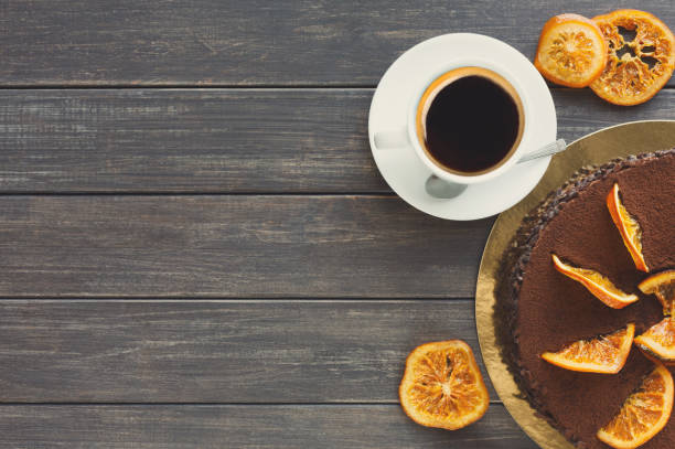 istock Chocolate cake with cream and profiterole 877382068