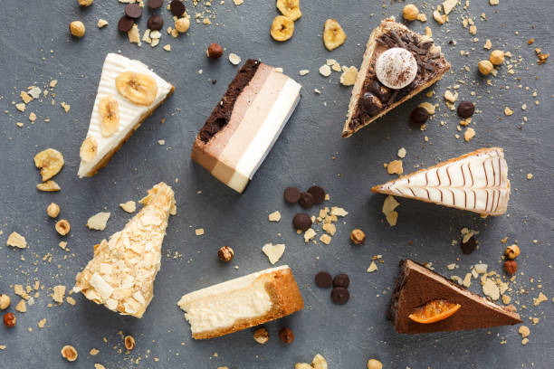 istock Assortment of pieces of cake, copy space 877382254