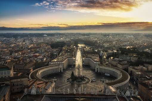 Rome city view in the morning on top of the Saint Peter's Basilica Dome.