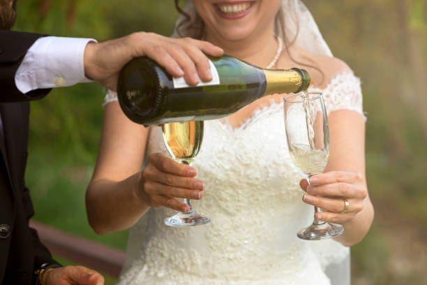 istock Bride and groom in a garden 877386568