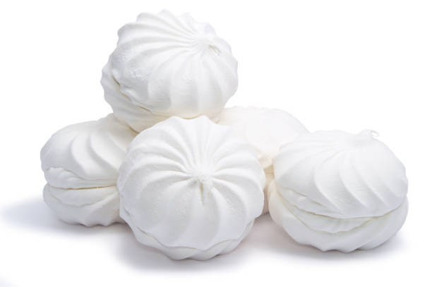 istock Sweet dessert white zephyr marshmallows  isolated on white background, 877394690