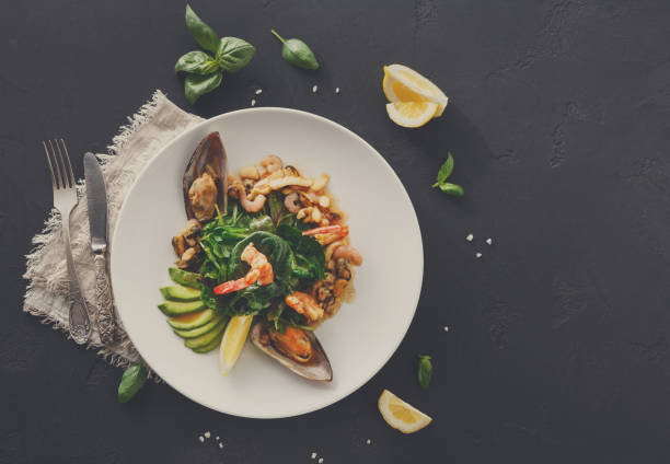 istock Warm salad with grilled seafood flat lay 877395102