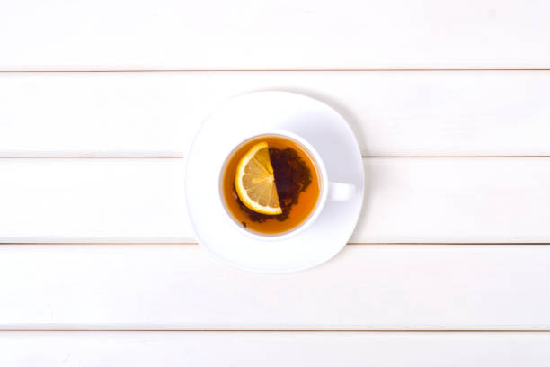 istock A cup of tea with lemon on a saucer 877437736
