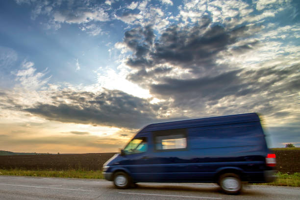 istock Delivery van on a country road. 877474326